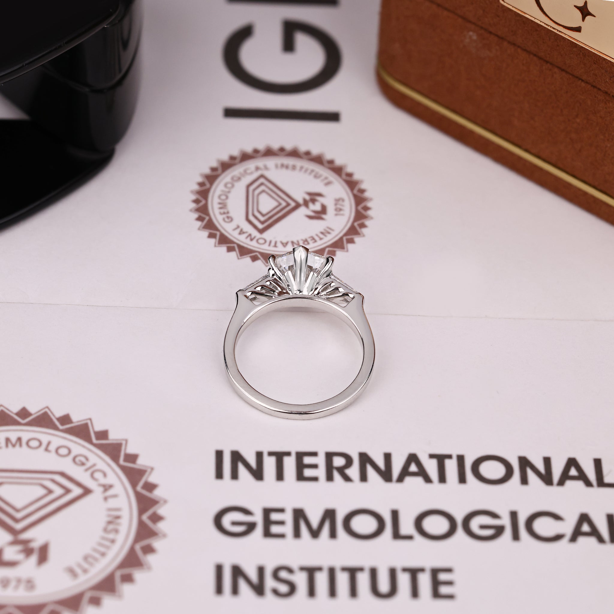 Hexagon and Tapered Baguette Cut Three Diamond Ring