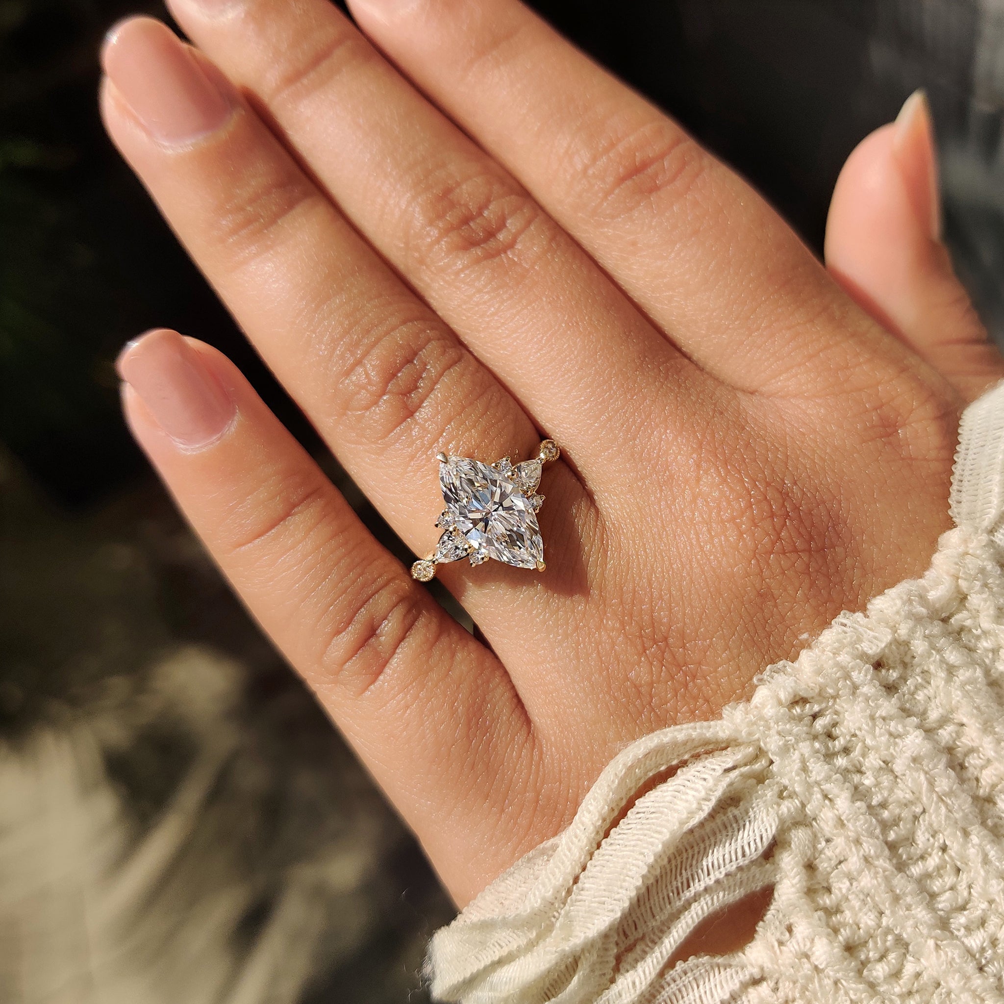 Marquise Cut Ring with Pear and Round Side Stones