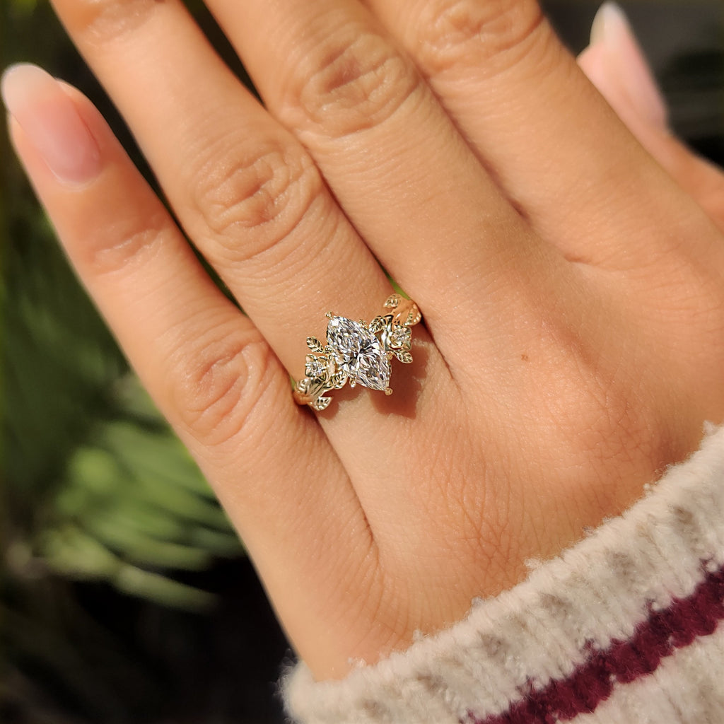 Nature Inspired Marquise Cut Engagement Ring with Round Side Stone