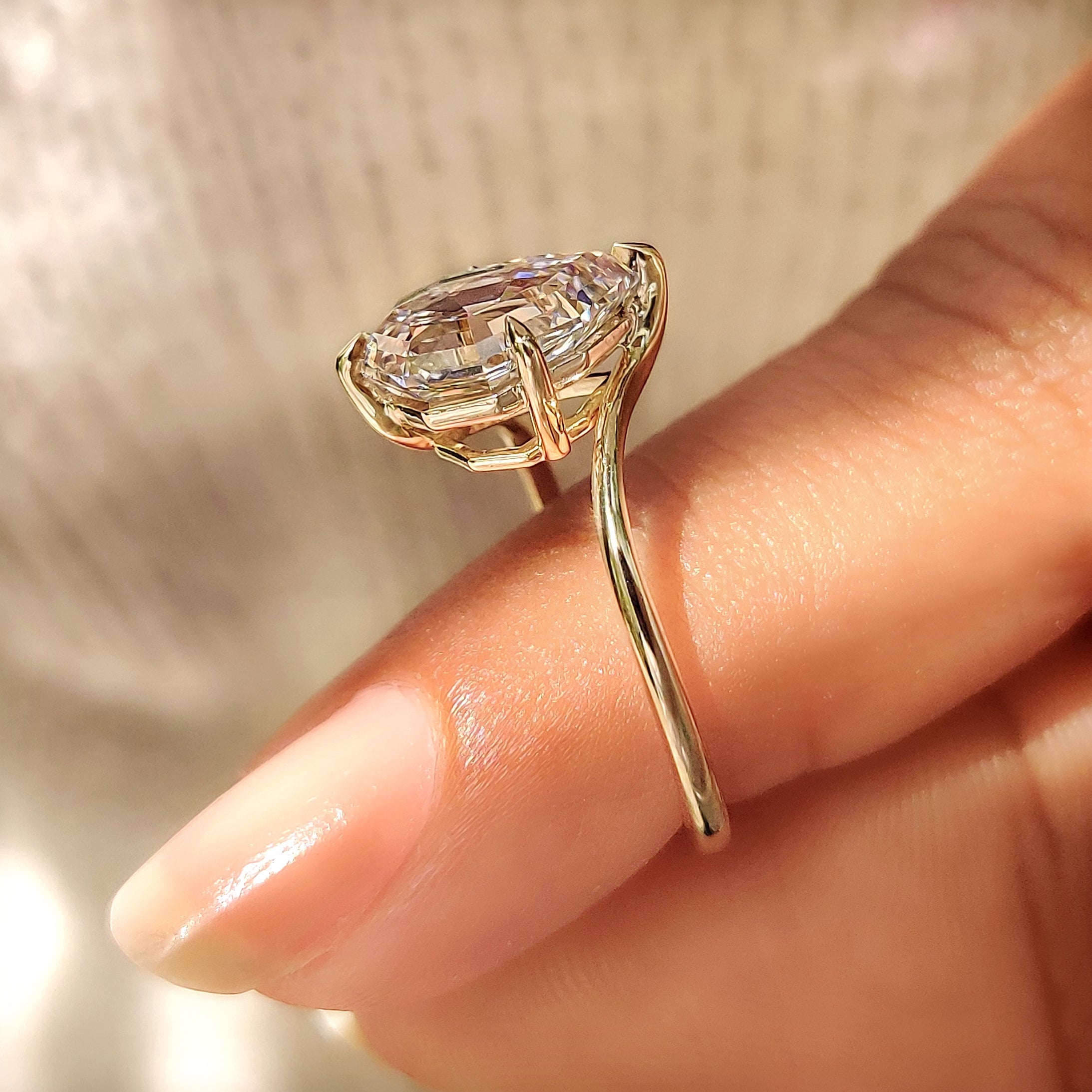 Pear Step Cut Diamond Solitaire Engagement Ring in Bypass Setting