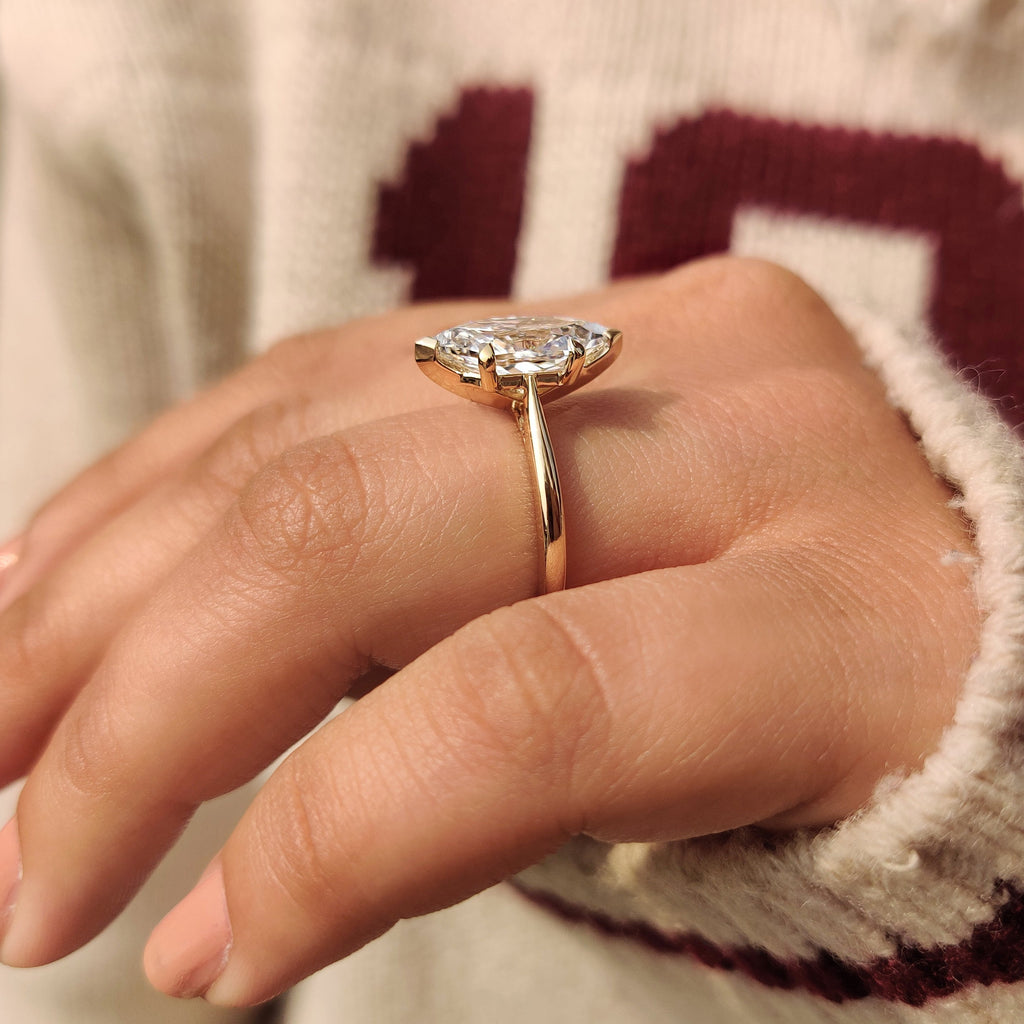 Solitaire Style Dutch Marquise Engagement Ring in Cathedral Setting