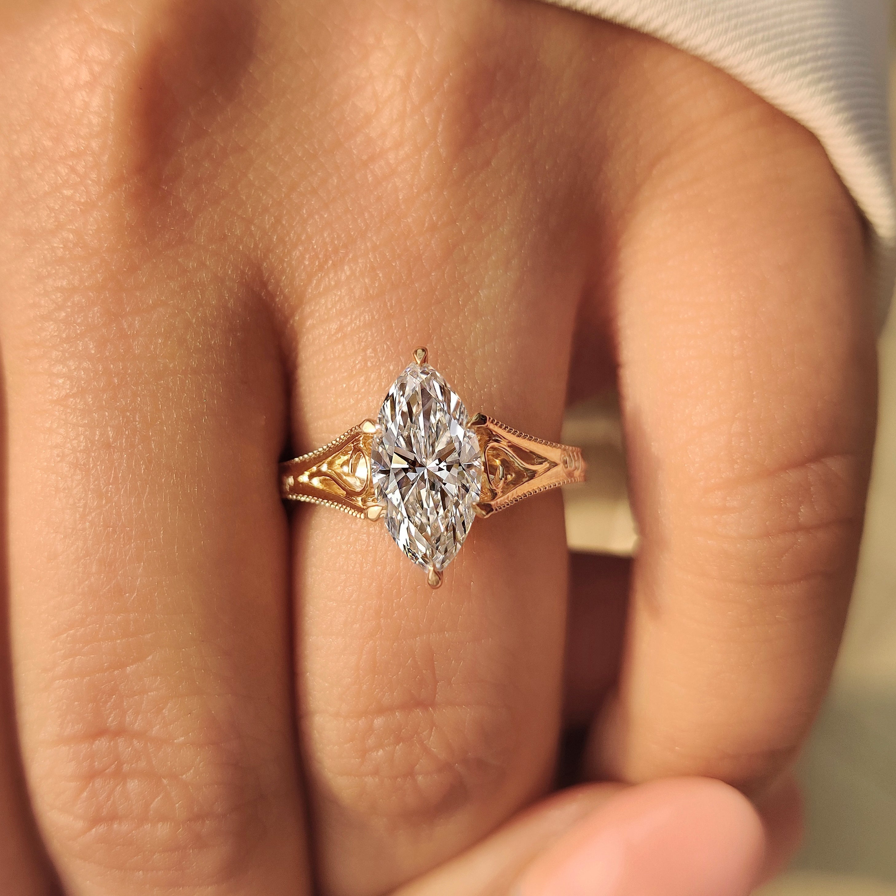 Solitaire Style Marquise Cut Diamond Ring in Milgrain Details