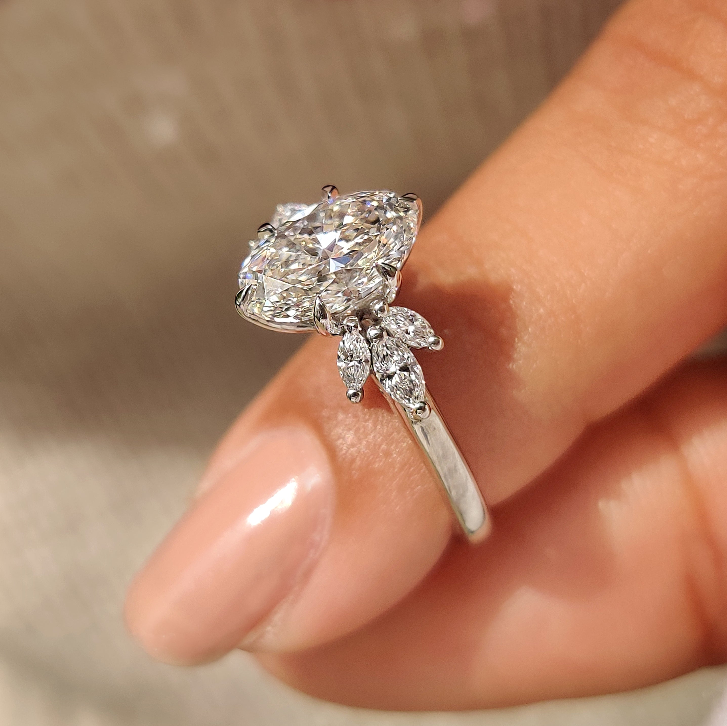 Oval Cut Diamond Ring With Side Stone Style In Muse Setting