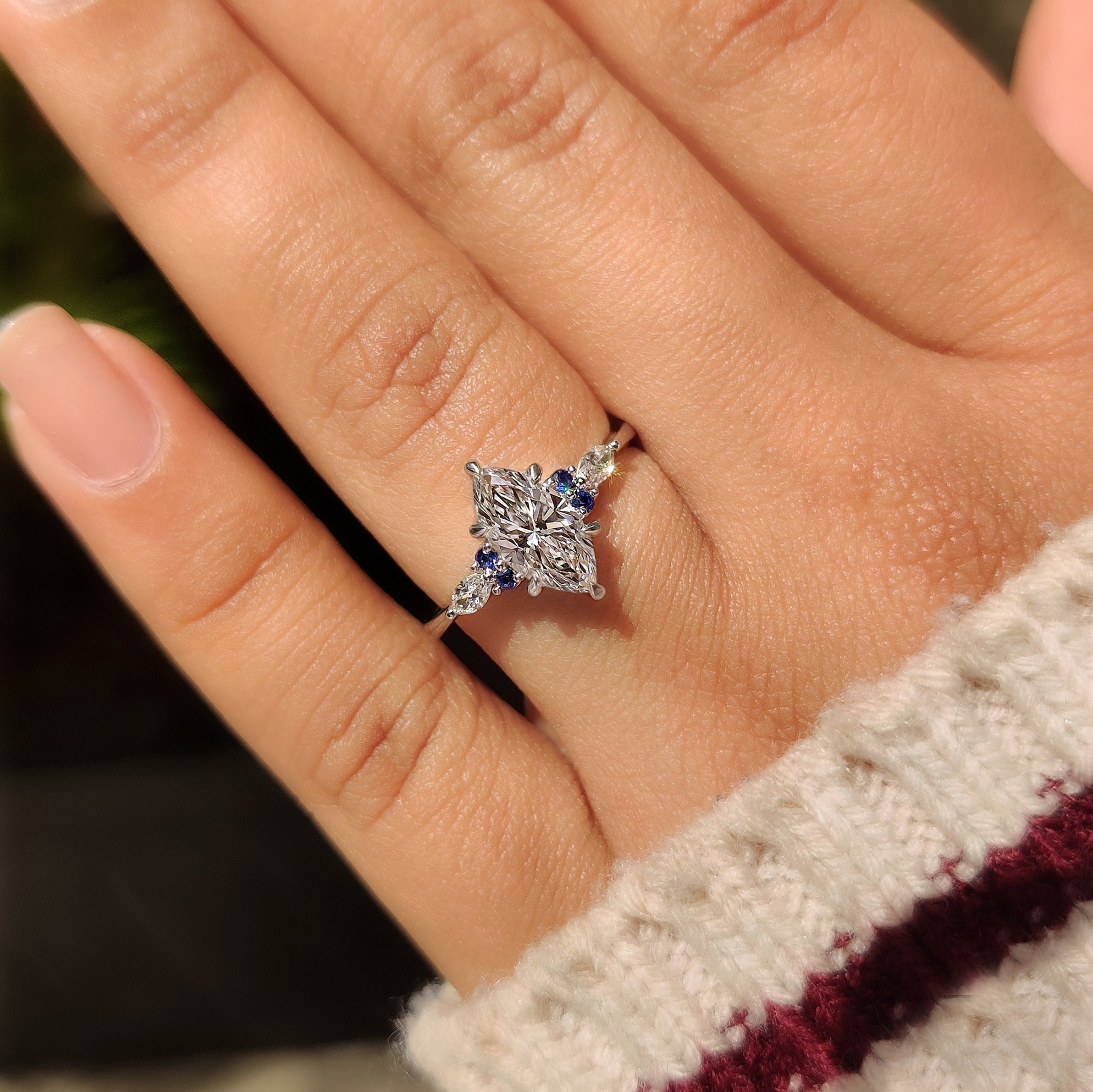 Marquise Cut Engagement Ring With Blue Sapphire Side Stone Style