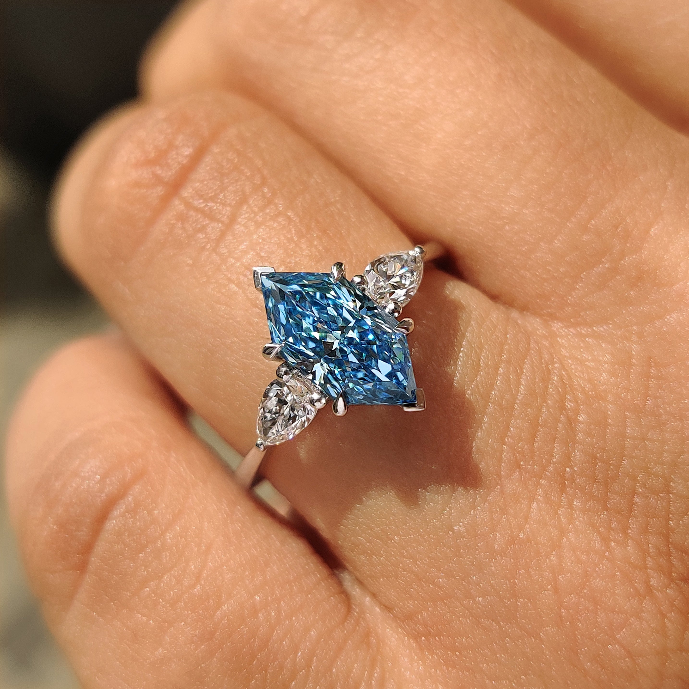 Blue Dutch Marquise Three Stone Ring with Pear Side Stones