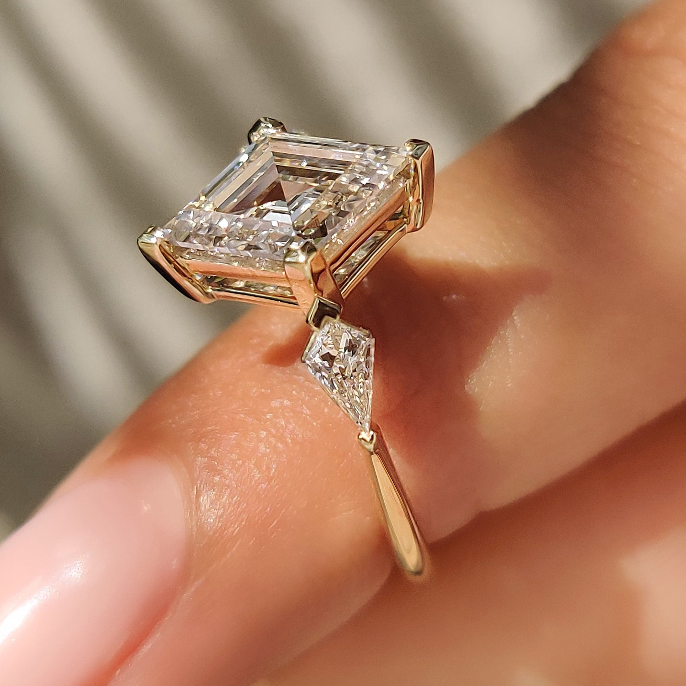 Lozenge Cut Engagement Ring with Kite Cut Side Stone