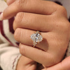 Oval Diamond Ring With Round Side Stones
