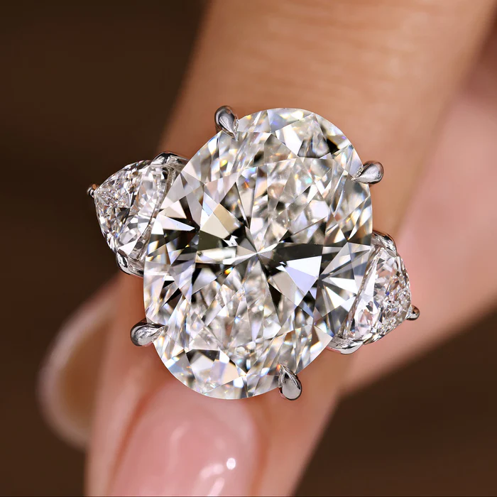 2 Carat Oval Diamond Ring in Three Stone Style