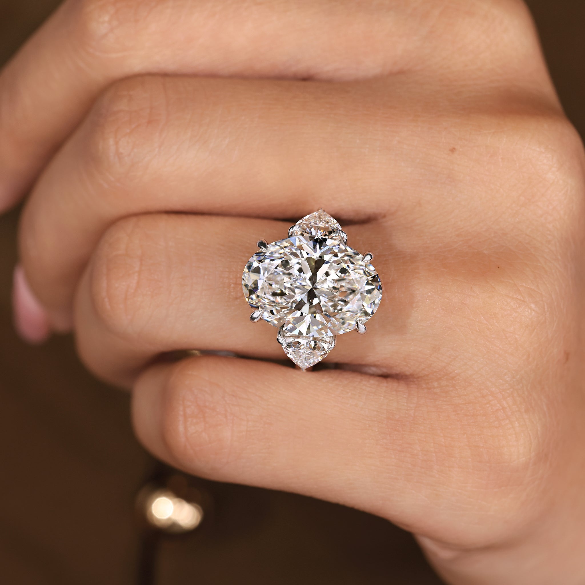 2 Carat Oval Diamond Ring in Three Stone Style