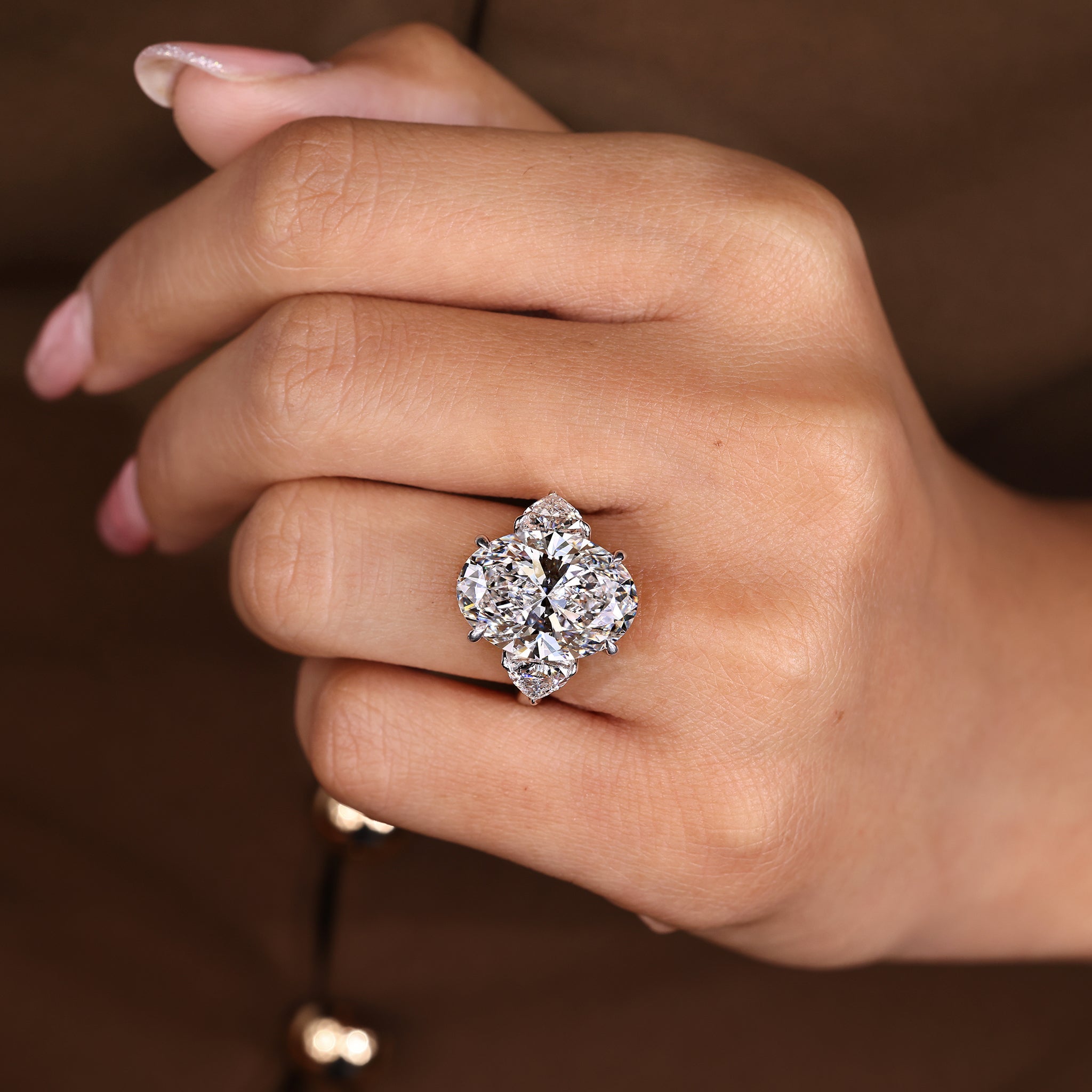 2 Carat Oval Diamond Ring in Three Stone Style