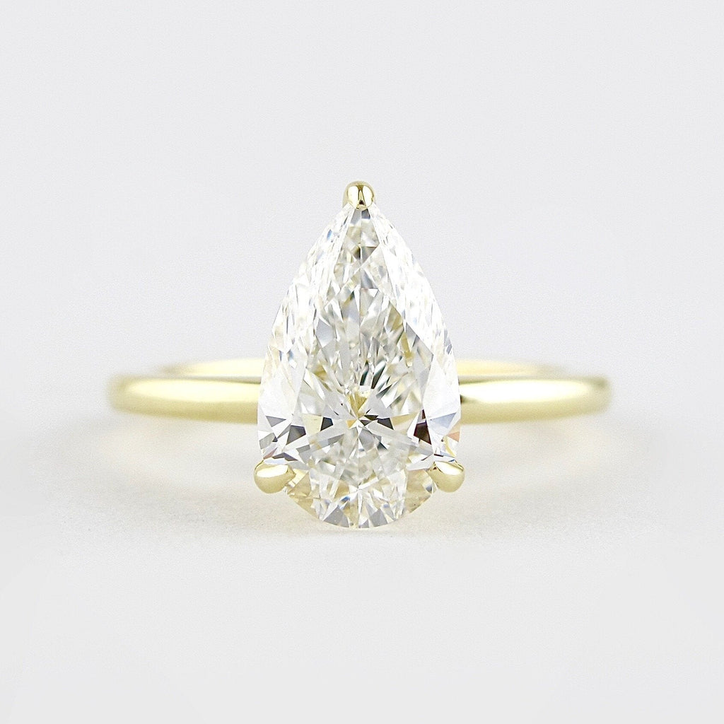 1.50 CT Pear Moissanite Solitaire Engagement Ring With Hidden Halo Setting