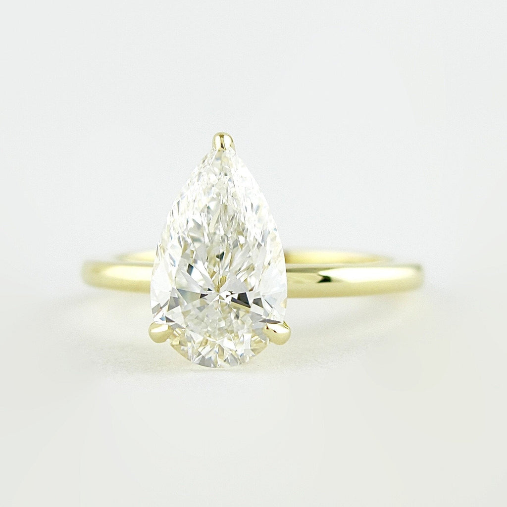 1.50 CT Pear Moissanite Solitaire Engagement Ring With Hidden Halo Setting