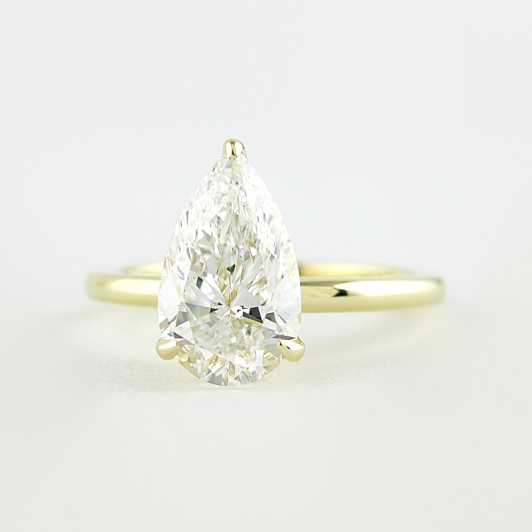 1.50 CT Pear Moissanite Solitaire Engagement Ring With Hidden Halo Setting