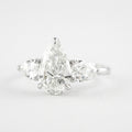 1.50 CT Pear Cut Moissanite 3 Stone Engagement Ring in 14K White Gold