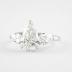 1.50 CT Pear Cut Moissanite 3 Stone Engagement Ring in 14K White Gold