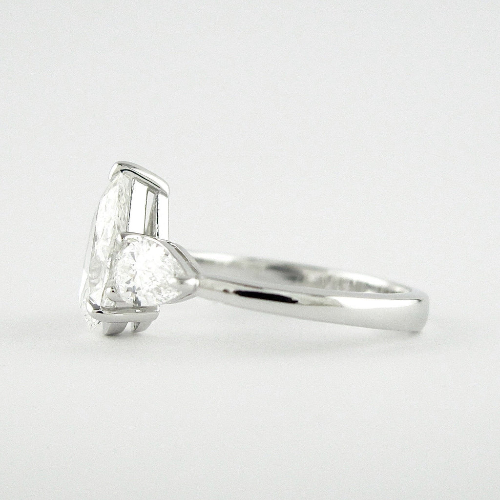 1.50 CT Pear Cut Moissanite 3 Stone Engagement Ring in 14K White Gold