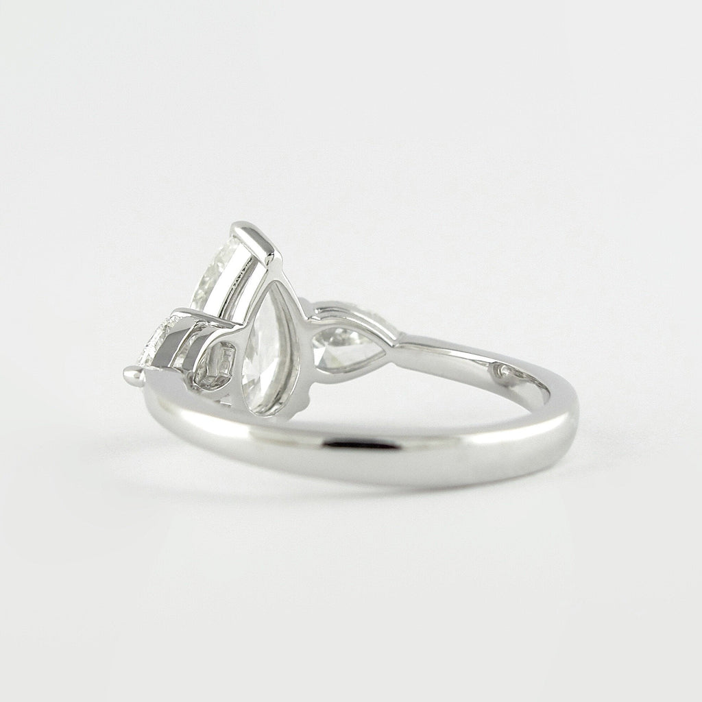 1.50 CT Pear Cut Moissanite 3 Stone Engagement Ring in 14K White Gold