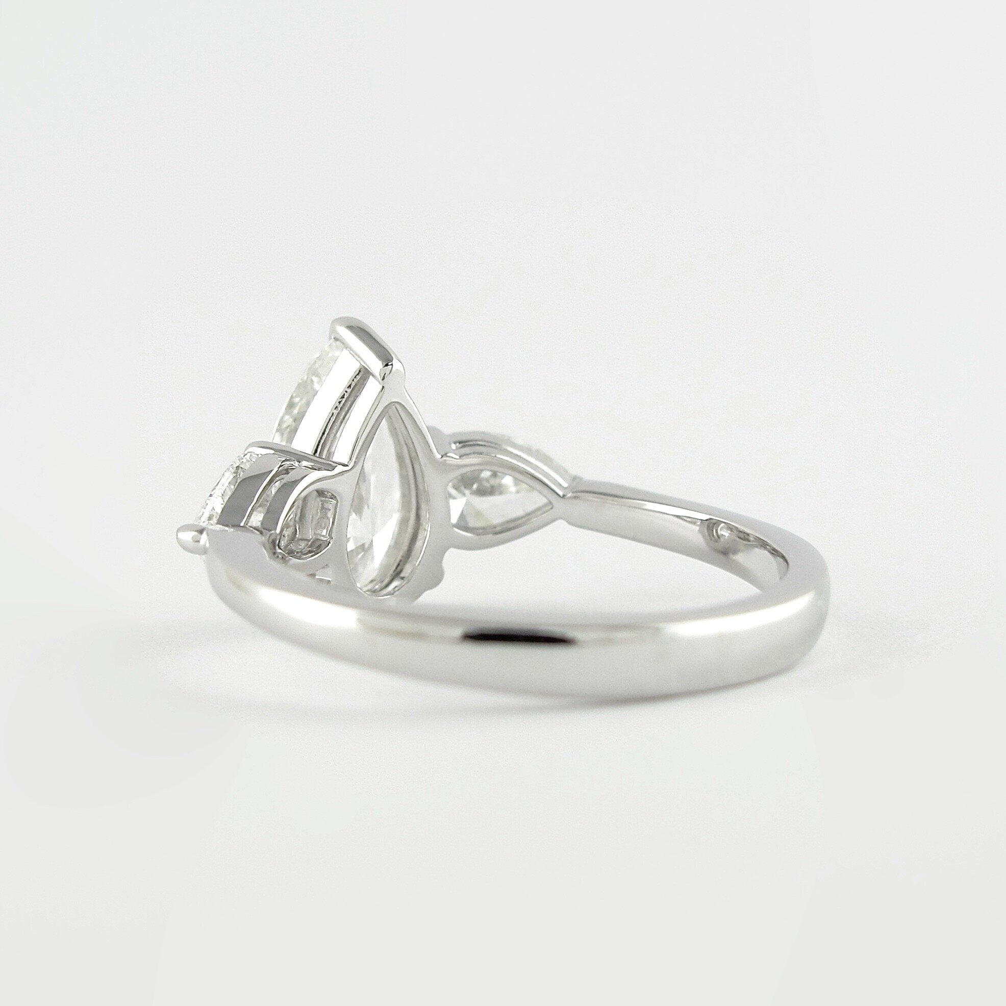 1.50 CT Pear Cut Moissanite 3 Stone Engagement Ring in 14K White Gold
