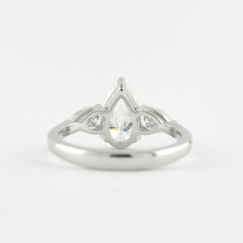 1.50 CT Pear Cut Moissanite 3 Stone Engagement Ring in 14K White Gold