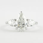 1.50 CT Pear Cut Moissanite 3 Stone Engagement Ring in 14K White Gold