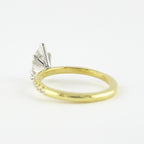 0.94 CT Pear Cut Moissanite Pave Style Engagement Ring