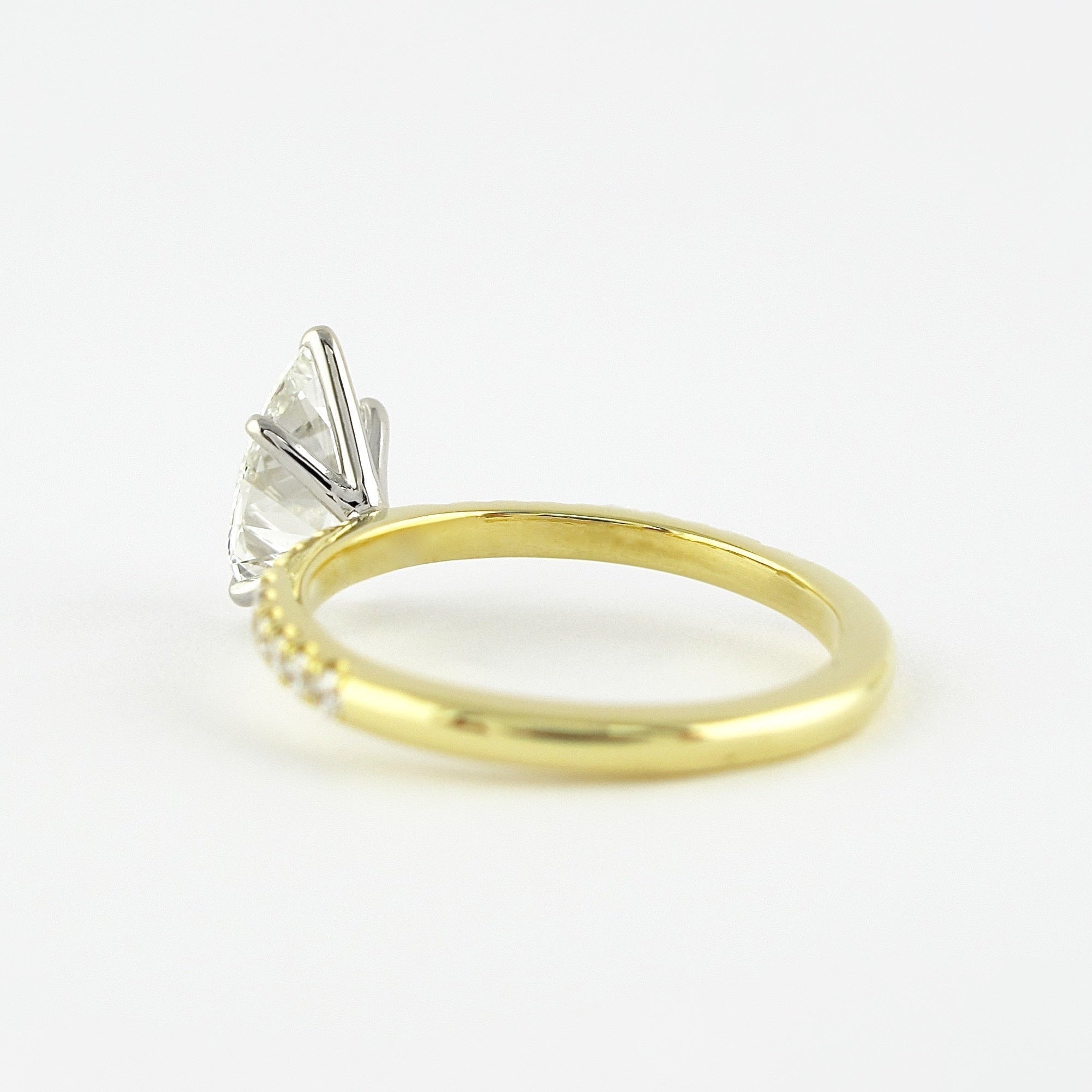 0.94 CT Pear Cut Moissanite Pave Style Engagement Ring