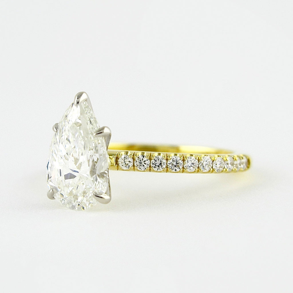 0.94 CT Pear Cut Moissanite Pave Style Engagement Ring