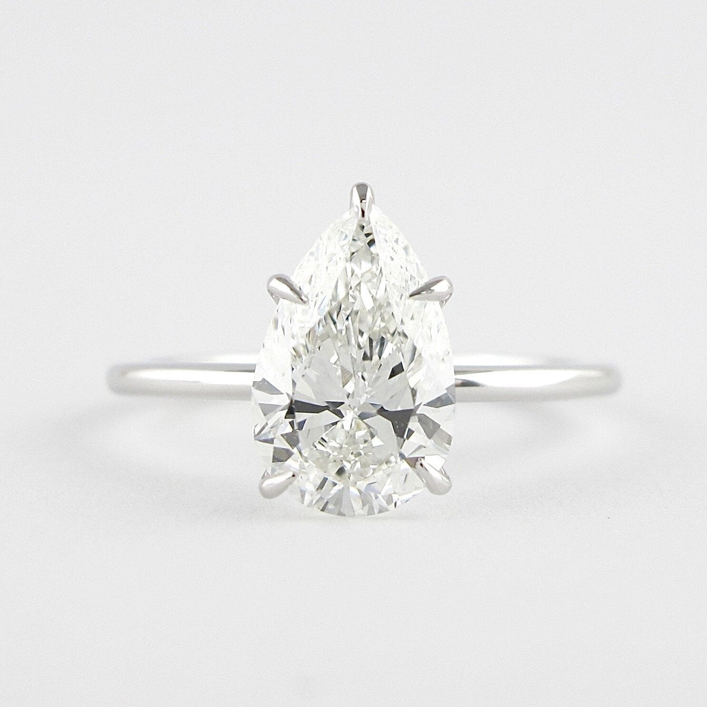 1.50 CT Pear Cut Solitaire Moissanite Engagement Ring