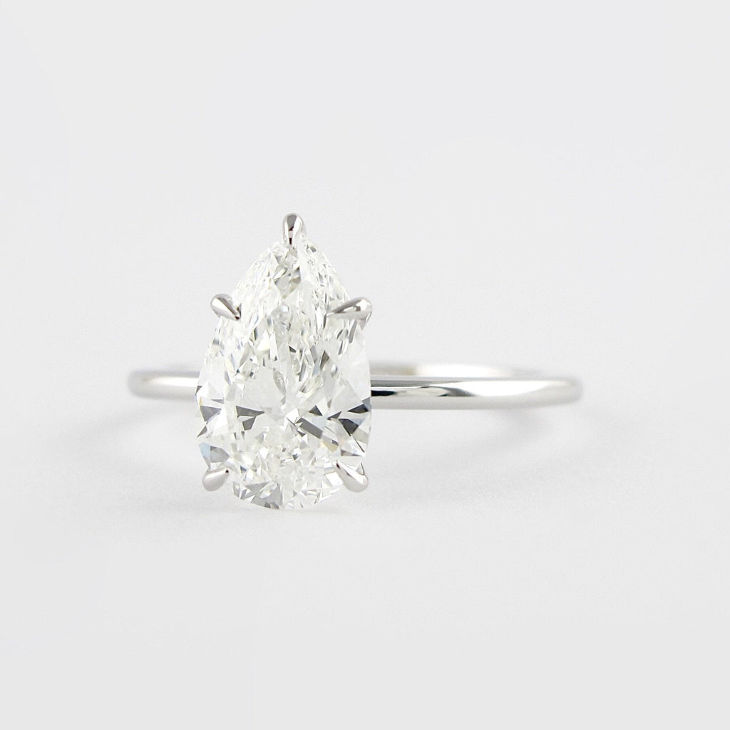 1.50 CT Pear Cut Solitaire Moissanite Engagement Ring