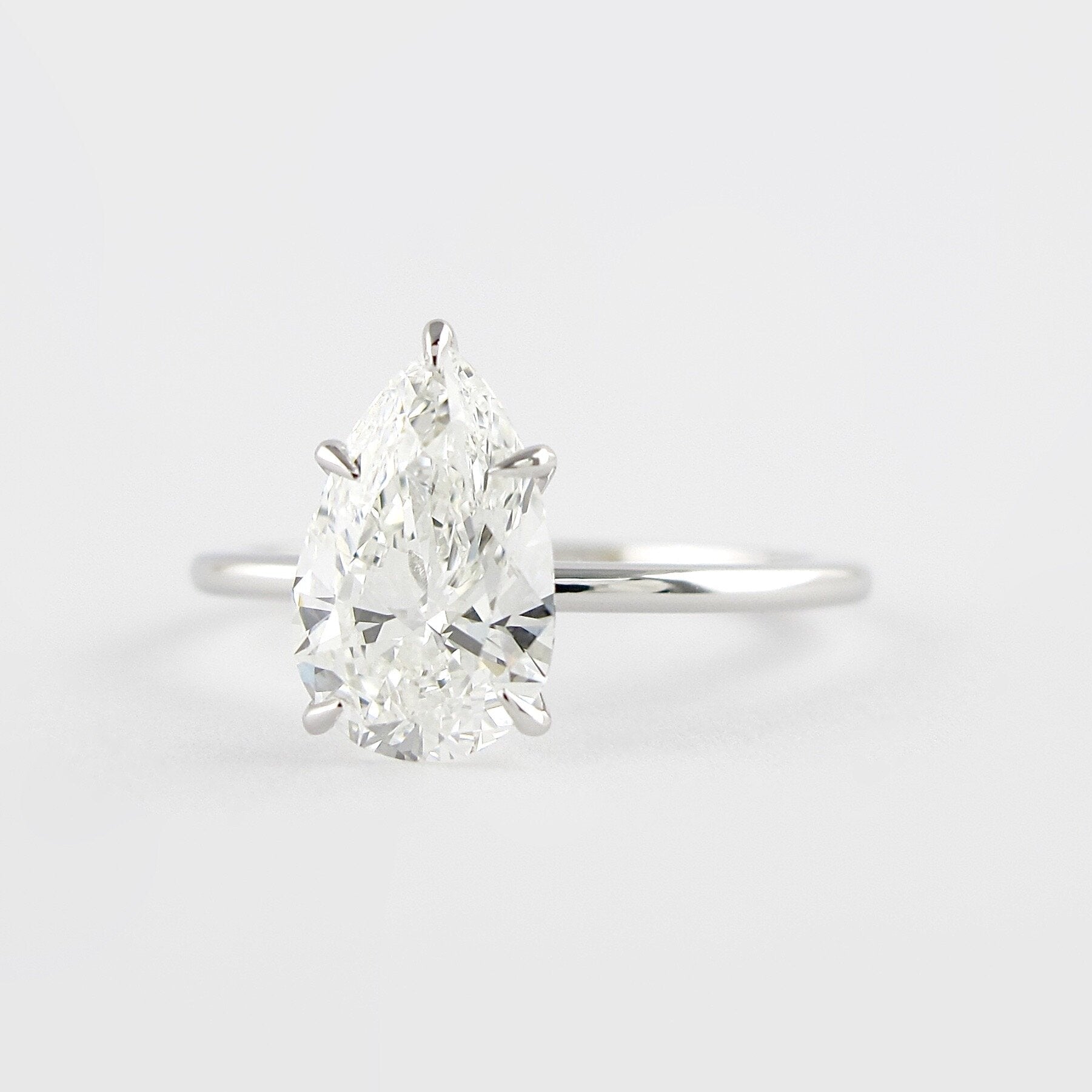 1.50 CT Pear Cut Solitaire Moissanite Engagement Ring