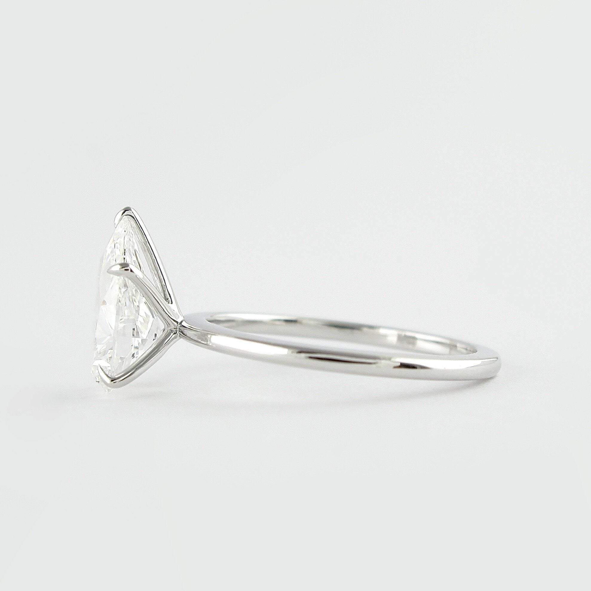 1.50 CT Pear Cut Solitaire Moissanite Engagement Ring