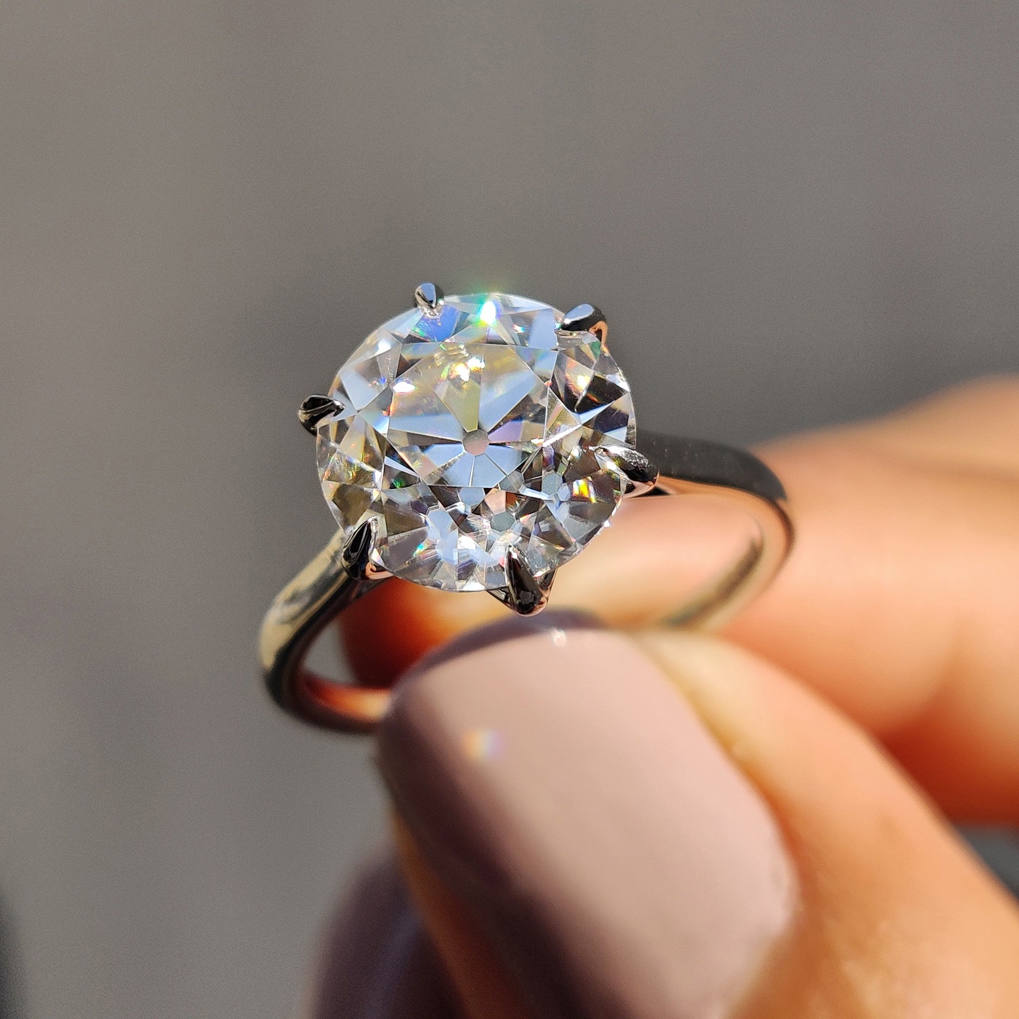 Old European Cut Ring In Cathedral Setting