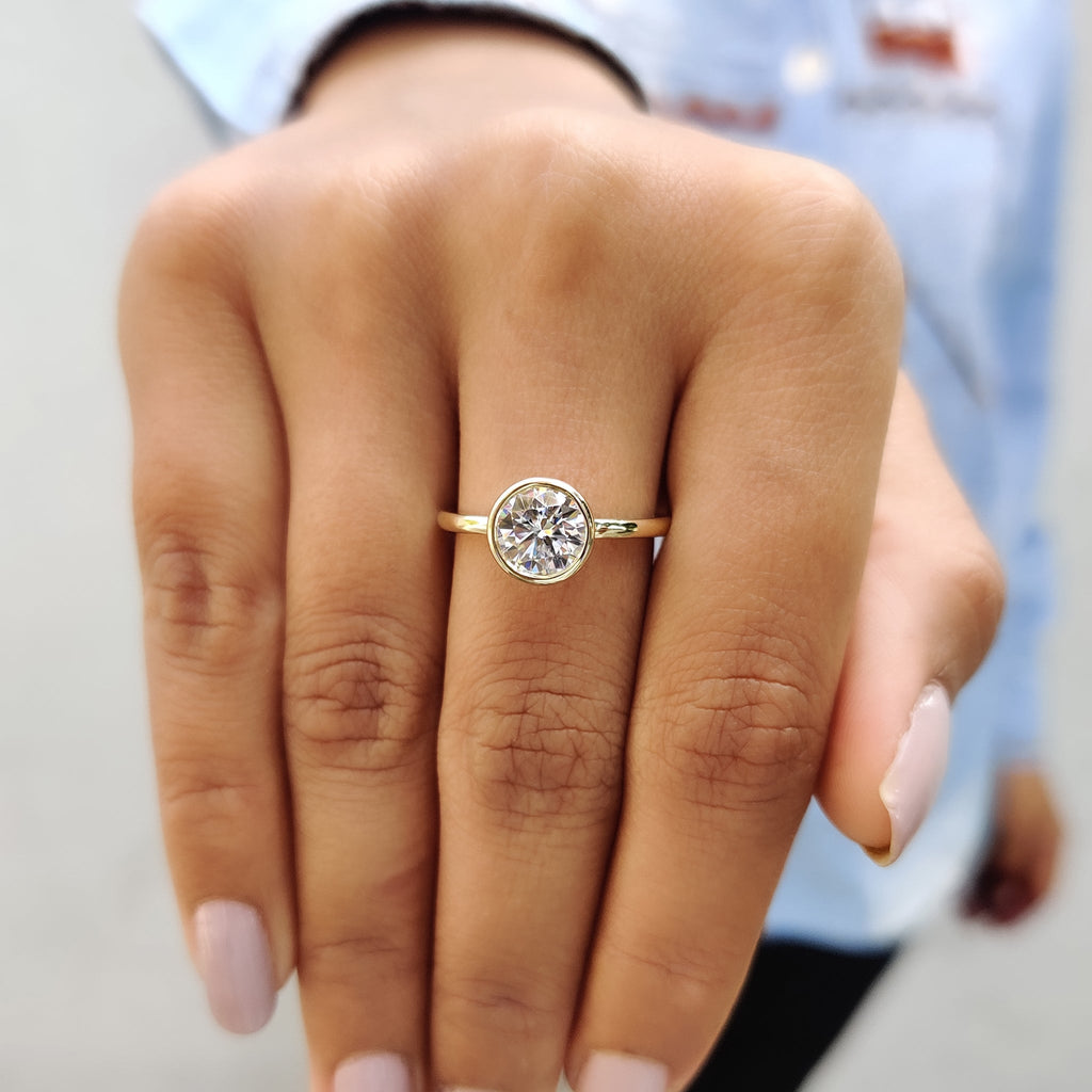 Round Cut Ring In Bezel Setting