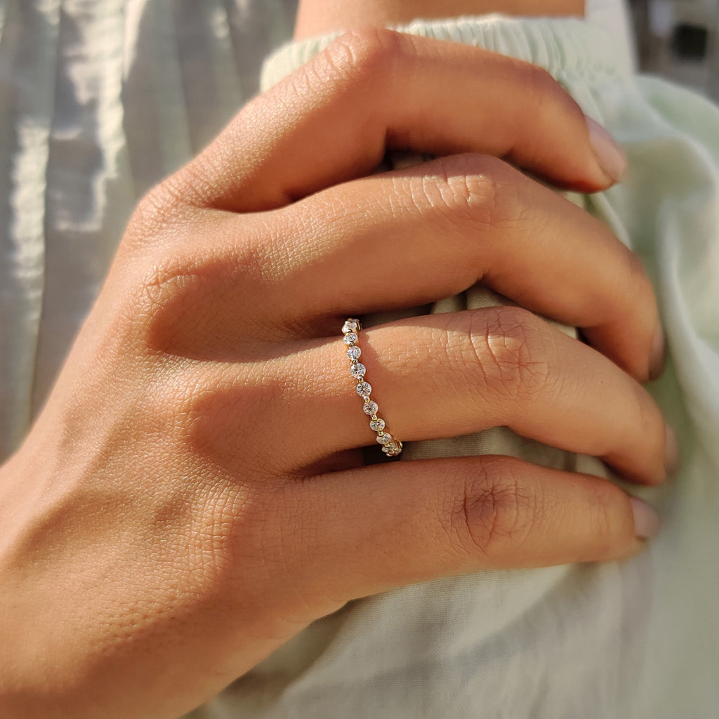 Round Moissanite Yellow Gold Eternity Band
