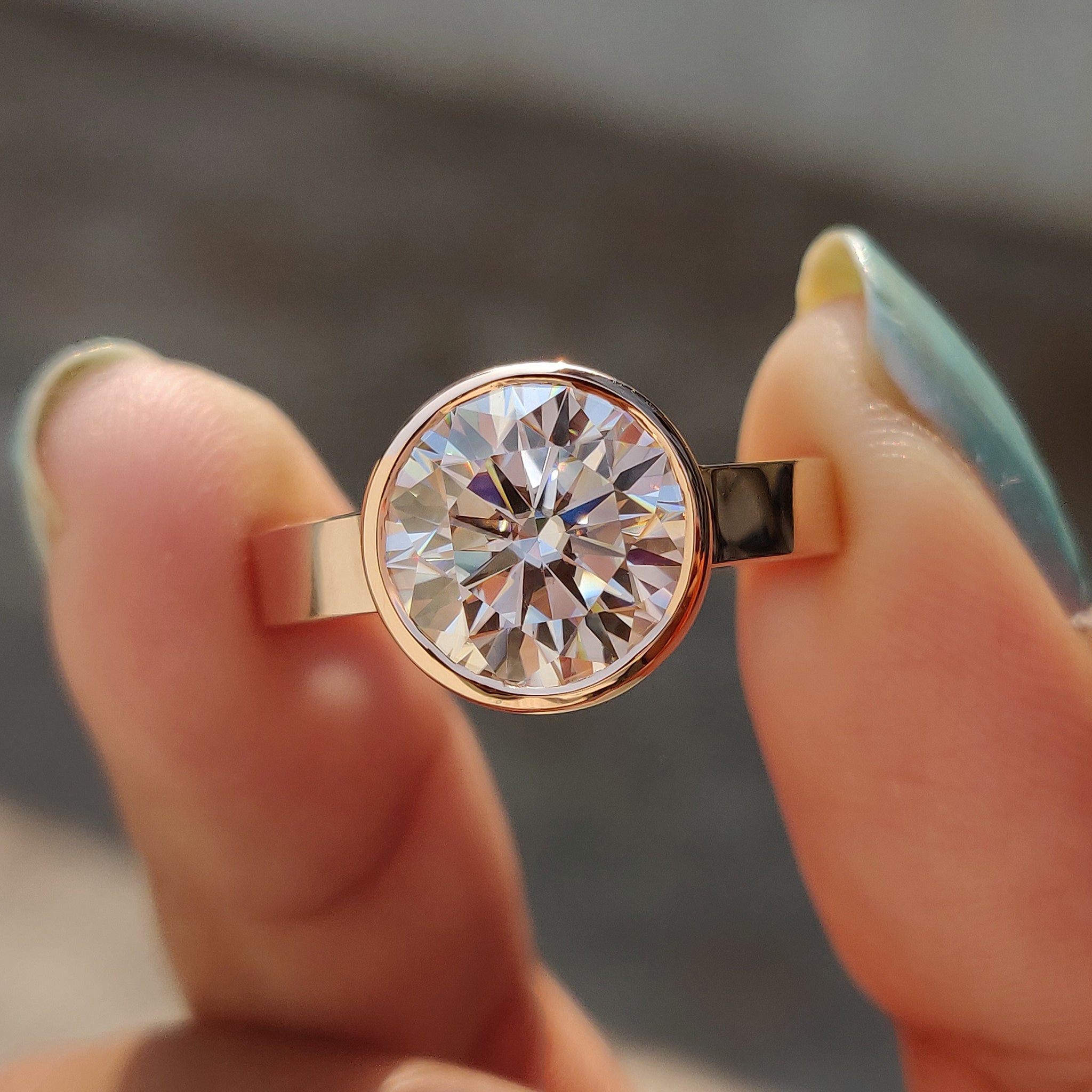 Round Cut Bezel Set Moissanite Ring Main image