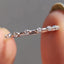 Round Moissanite Wedding Band In Distance Pave Setting