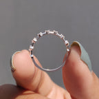 Round Moissanite Wedding Band In Distance Pave Setting