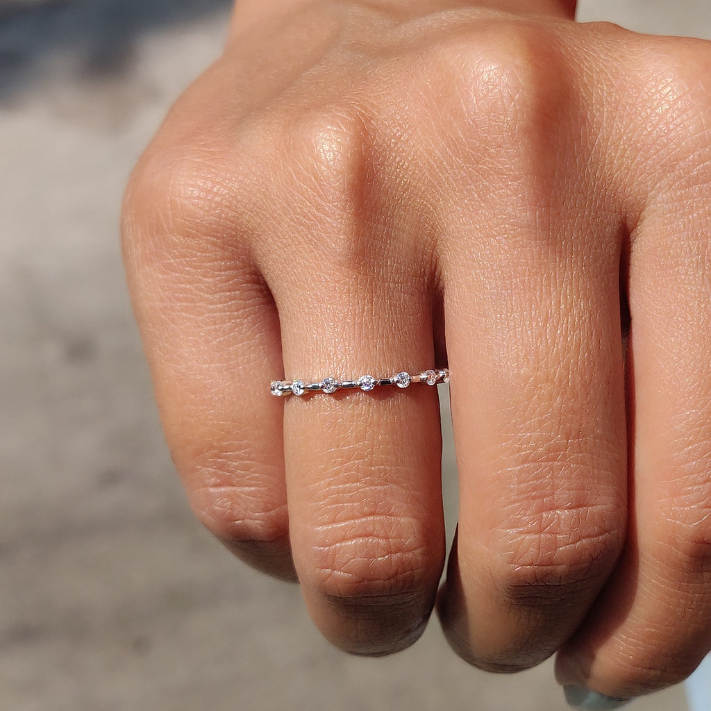 Round Moissanite Wedding Band In Distance Pave Setting