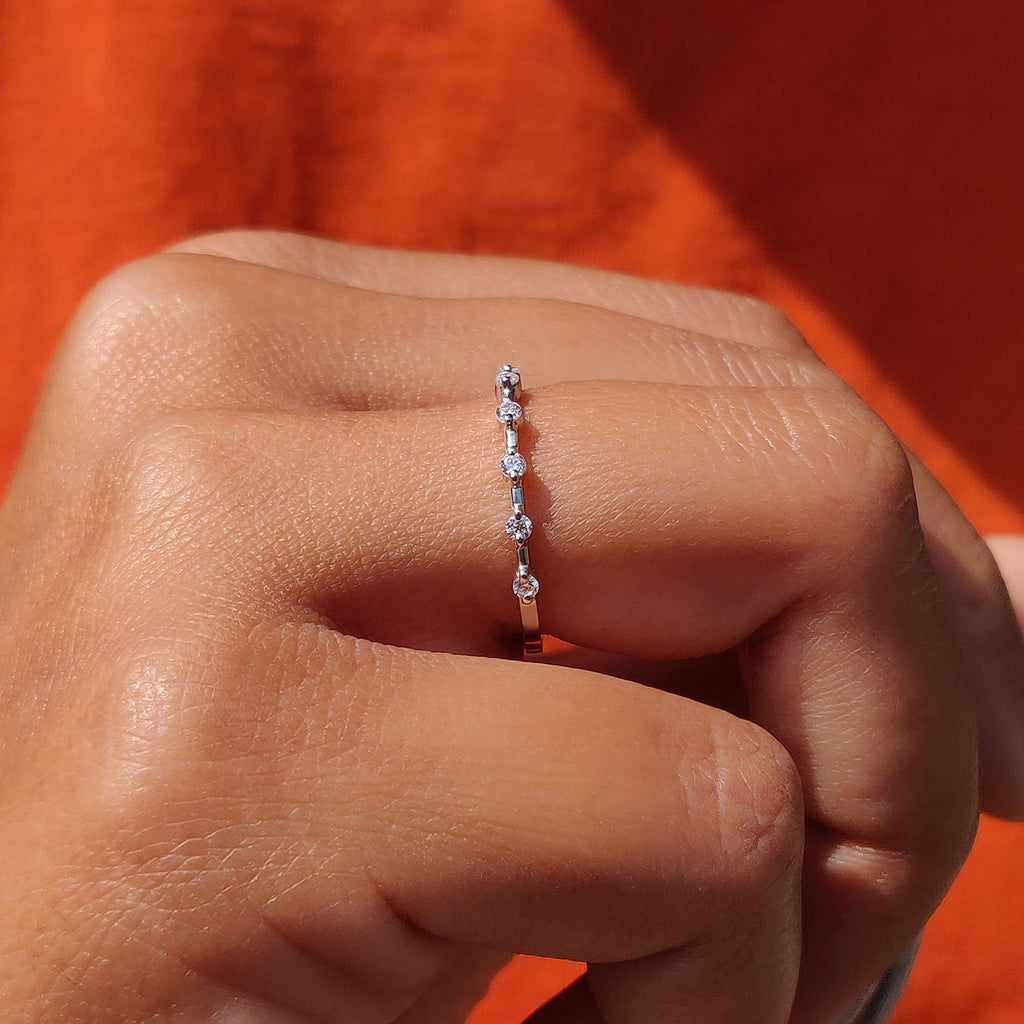 Round Moissanite Wedding Band In Distance Pave Setting