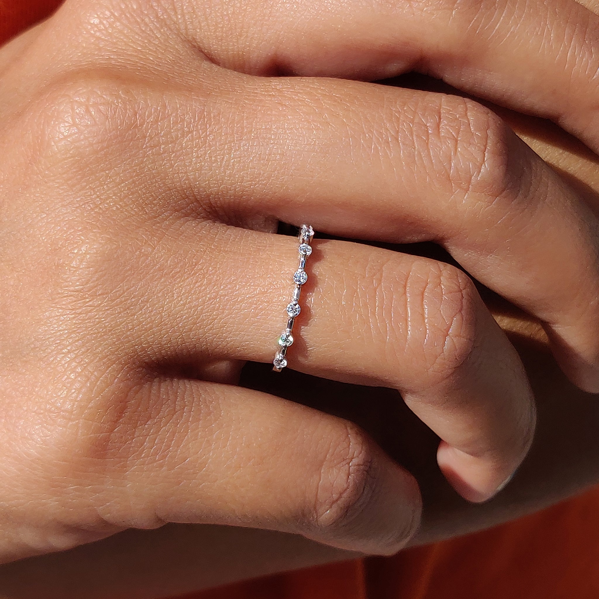Round Moissanite Wedding Band In Distance Pave Setting