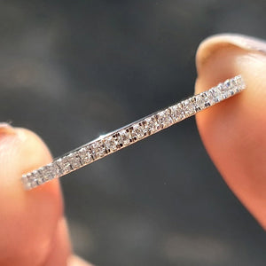 Round Moissanite White Gold Eternity Band