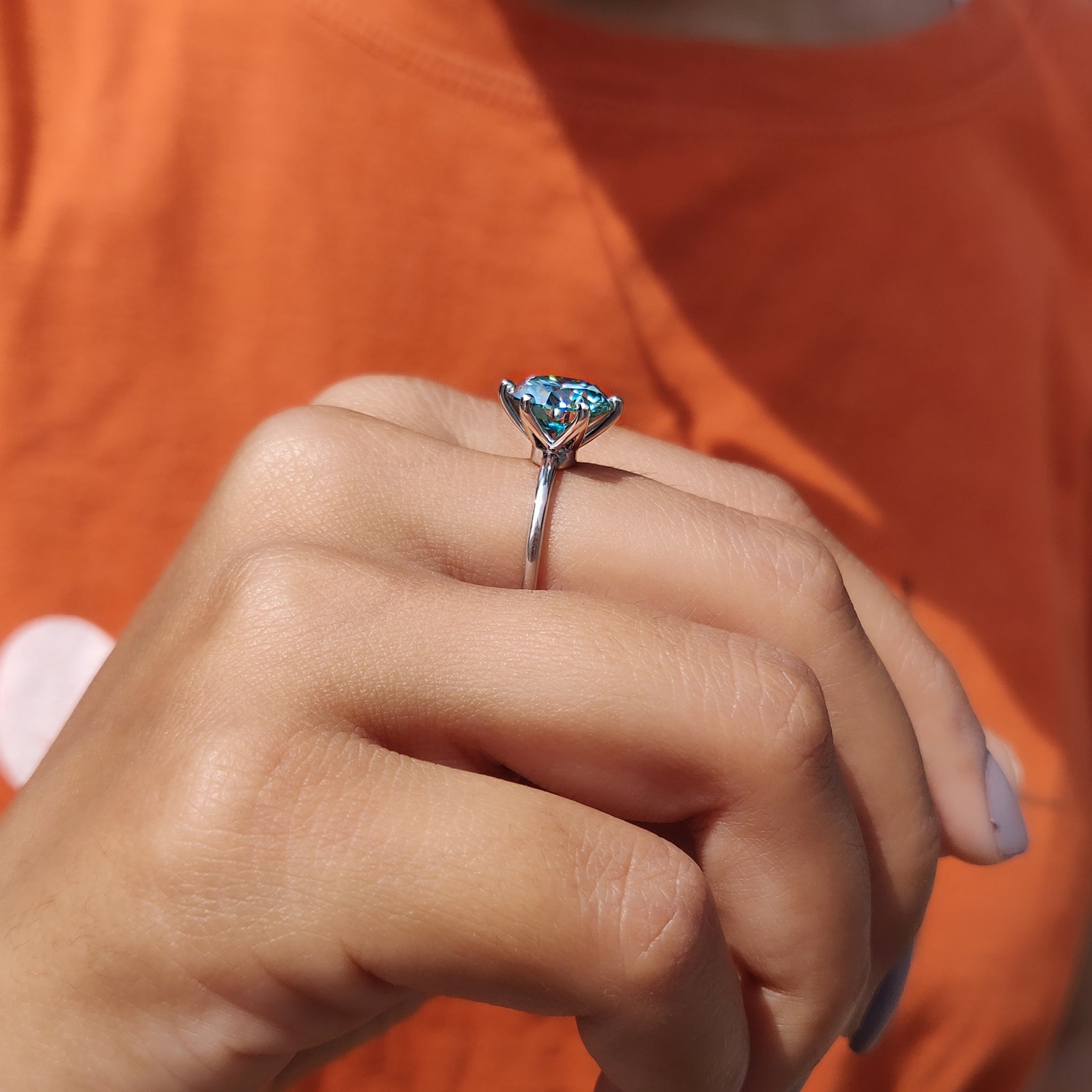 Round Cut Engagement Ring In Solitaire Style