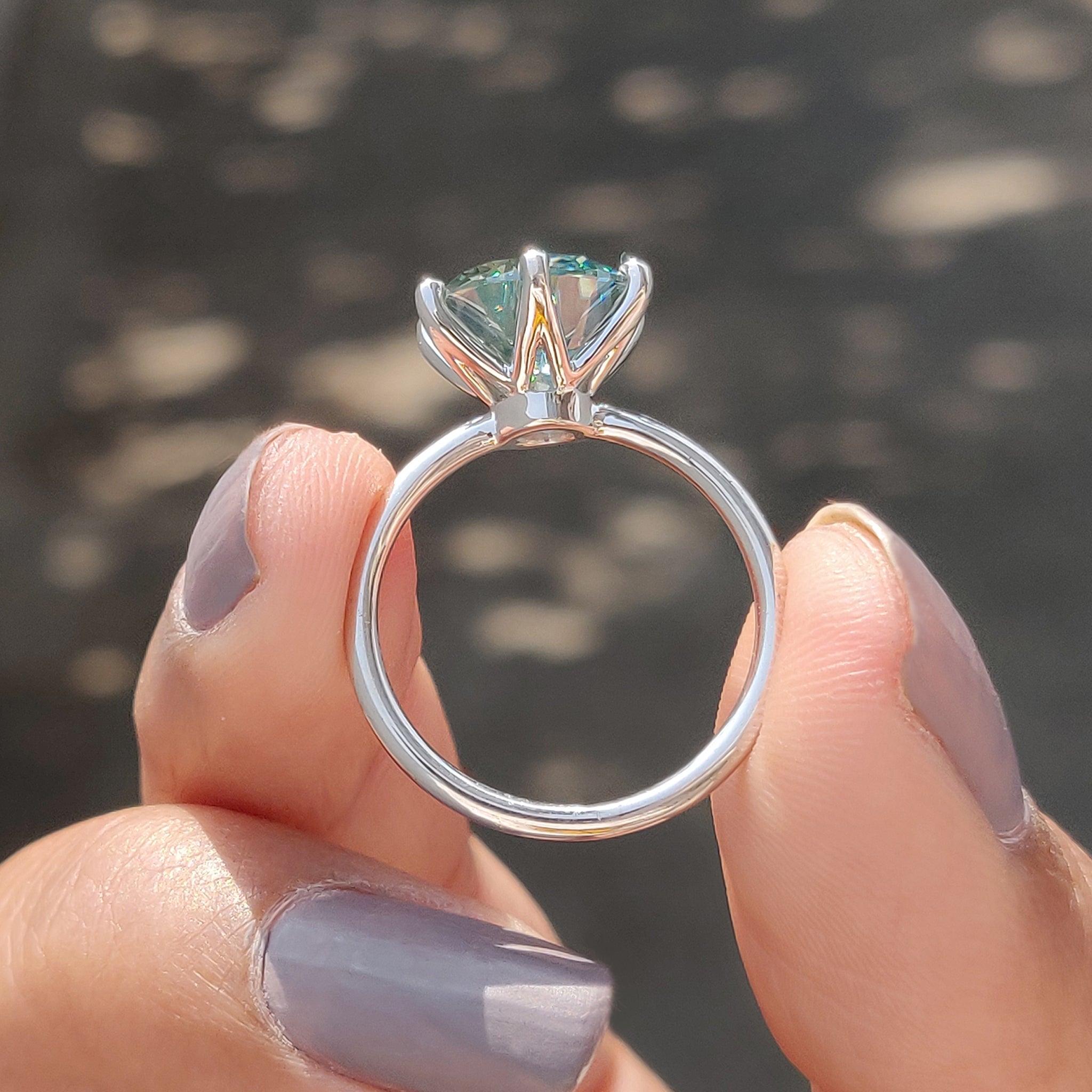 Round Cut Engagement Ring In Solitaire Style
