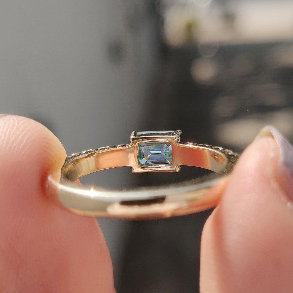 Emerald Cut Engagement Ring In East To West Style