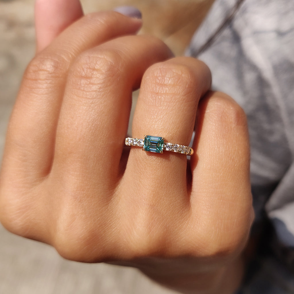Emerald Cut Engagement Ring In East To West Style
