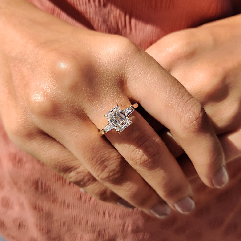 Emerald Cut Ring With Tapered Baguette Side Stone