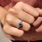Cyan Blue Round Cut Engagement Ring With Twisted Pave