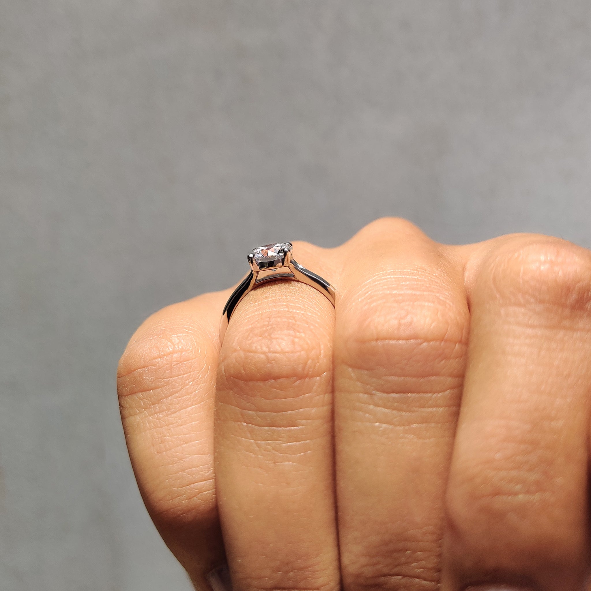 Round Solitaire Engagement Ring In Cathedral Setting