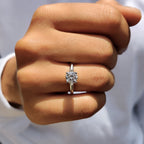 Round Solitaire Engagement Ring In Cathedral Setting