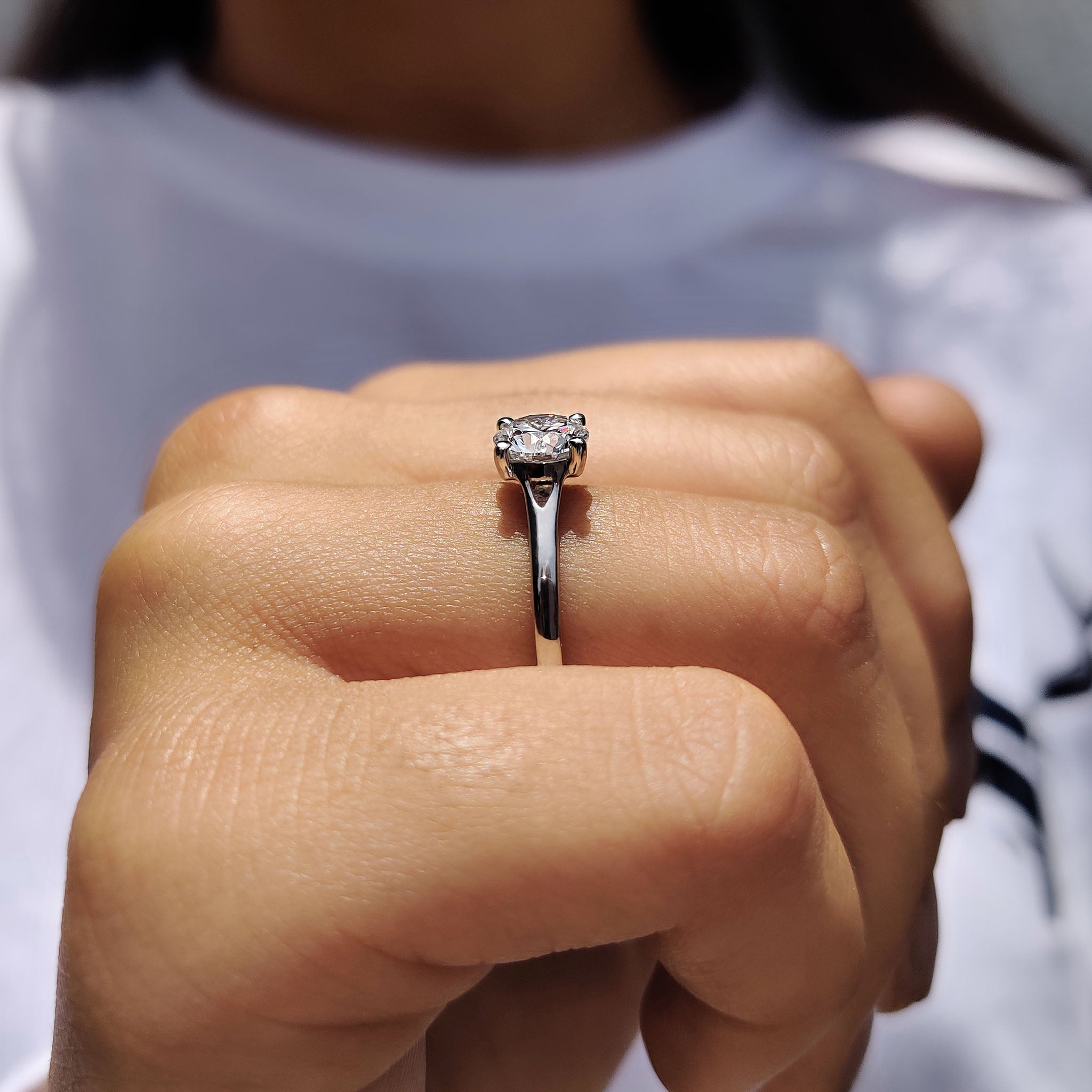Round Solitaire Engagement Ring In Cathedral Setting